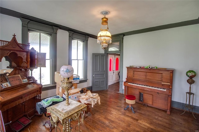 1508 State Route 140, Smithboro, IL 62284 - living area with ornamental molding, wood finished floors, a chandelier, and baseboards