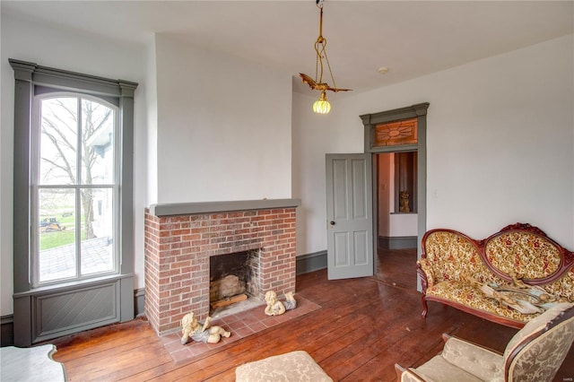 1508 State Route 140, Smithboro, IL 62284 - living area featuring wood-type flooring, plenty of natural light, and a fireplace