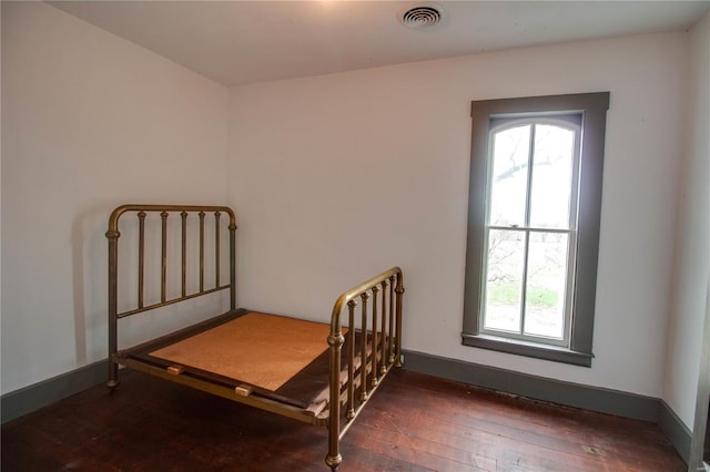 1508 State Route 140, Smithboro, IL 62284 - bedroom with wood-type flooring, multiple windows, and baseboards