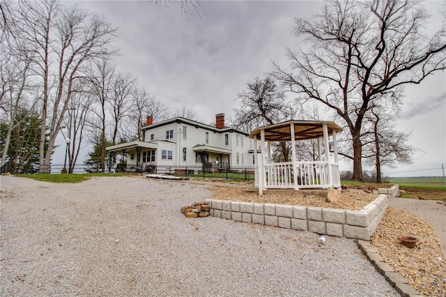 1508 State Route 140, Smithboro, IL 62284 - view of front of home featuring a chimney and fence