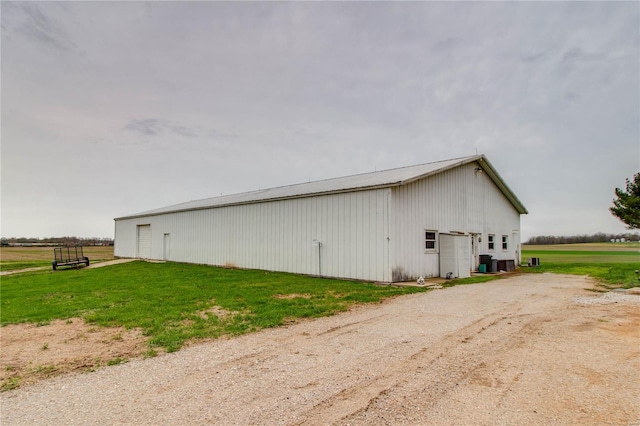 1508 State Route 140, Smithboro, IL 62284 - view of side of property with an outbuilding, an outdoor structure, a lawn, and metal roof