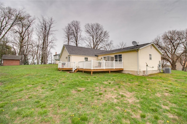 1508 State Route 140, Smithboro, IL 62284 - back of house with a wooden deck, central AC, and a lawn