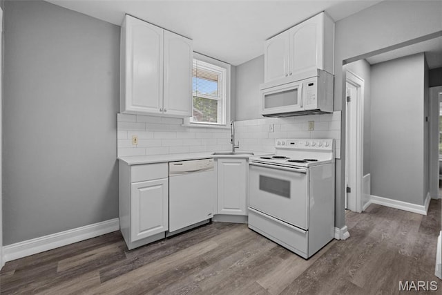 8315 Jefferson Ave, Vinita Park, MO 63114 - kitchen with white appliances, white cabinetry, dark wood-style floors, and light countertops