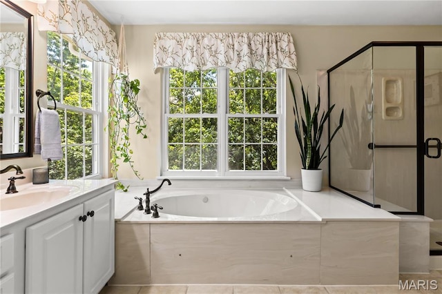 16112 Ridgewoods Manor Cir, Ellisville, MO 63038 - full bathroom featuring vanity, a stall shower, and a bath