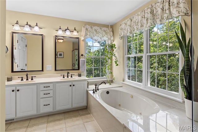 16112 Ridgewoods Manor Cir, Ellisville, MO 63038 - full bathroom featuring double vanity, plenty of natural light, a jetted tub, and tile patterned flooring