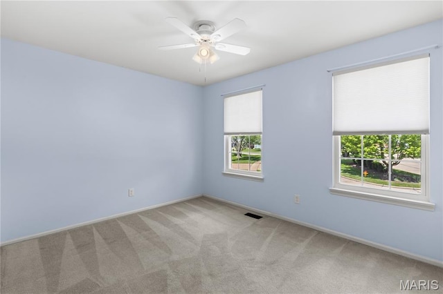 16112 Ridgewoods Manor Cir, Ellisville, MO 63038 - carpeted empty room featuring baseboards and a ceiling fan