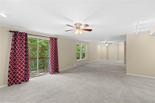 16112 Ridgewoods Manor Cir, Ellisville, MO 63038 - spare room with ceiling fan, a baseboard radiator, and carpet flooring