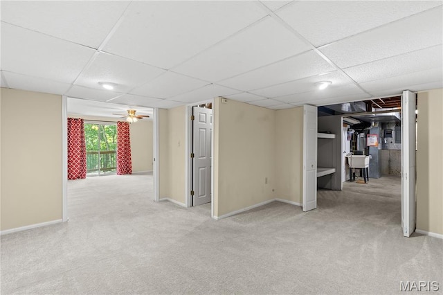 16112 Ridgewoods Manor Cir, Ellisville, MO 63038 - basement featuring a drop ceiling, carpet flooring, and baseboards