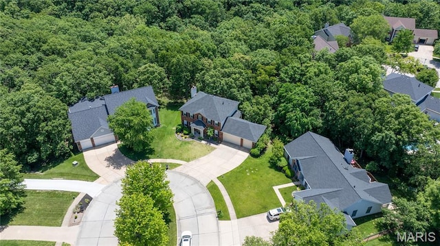 16112 Ridgewoods Manor Cir, Ellisville, MO 63038 - aerial perspective of suburban area featuring a heavily wooded area
