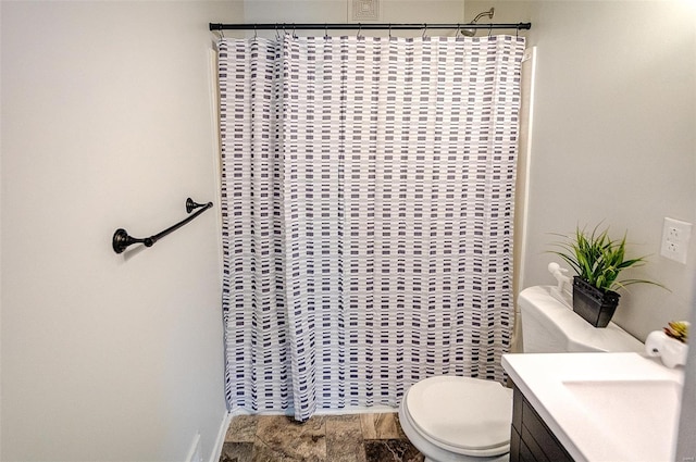 1810 N Van Buren St, Litchfield, IL 62056 - bathroom with toilet, a shower with shower curtain, vanity, and baseboards