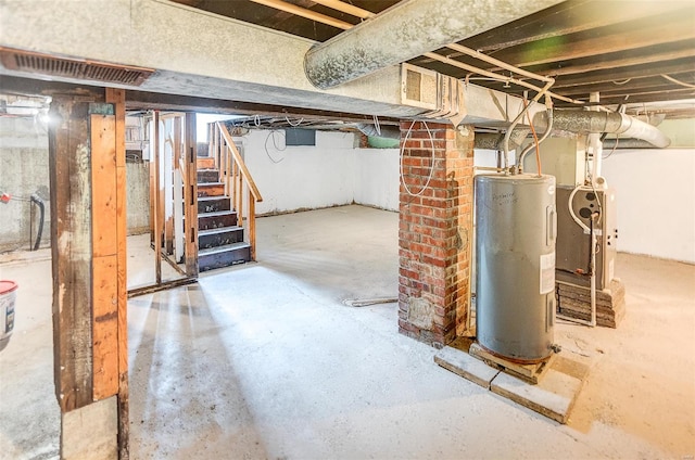 1810 N Van Buren St, Litchfield, IL 62056 - unfinished below grade area with water heater and stairway