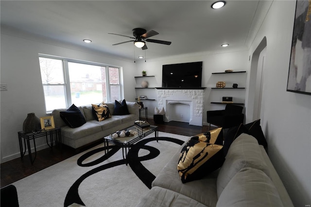 9235 Catalina Dr, Saint Louis, MO 63136 - living room featuring a ceiling fan, wood finished floors, recessed lighting, a fireplace, and baseboards
