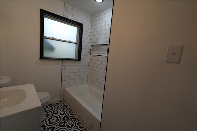 9235 Catalina Dr, Saint Louis, MO 63136 - full bath featuring toilet, baseboards, a bath, vanity, and tile patterned floors