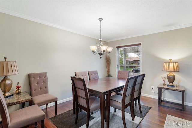 269 Braeshire Dr, Ballwin, MO 63021 - dining space featuring a chandelier, wood finished floors, crown molding, and baseboards