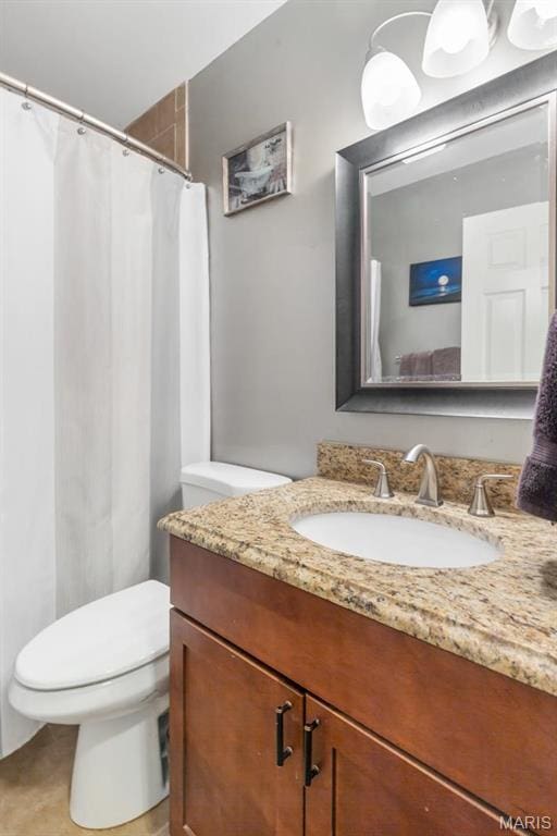 269 Braeshire Dr, Ballwin, MO 63021 - full bathroom with toilet, vanity, a shower with shower curtain, and tile patterned flooring