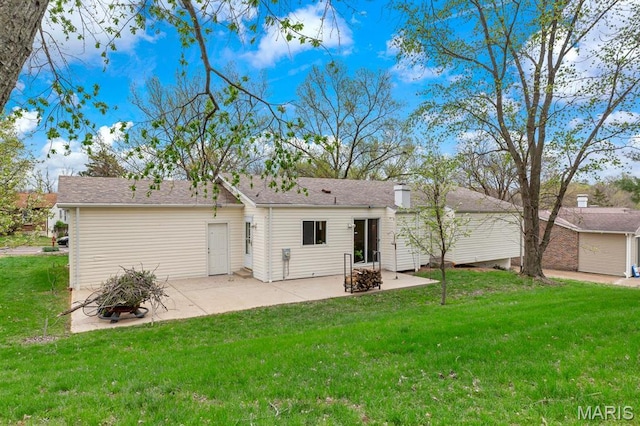 269 Braeshire Dr, Ballwin, MO 63021 - back of house featuring a lawn and a patio area