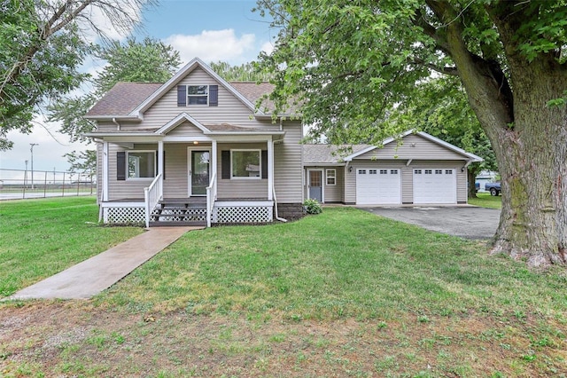 104 N 6th St, Witt, IL 62094 - view of front facade with covered porch, an attached garage, asphalt driveway, and a shingled roof