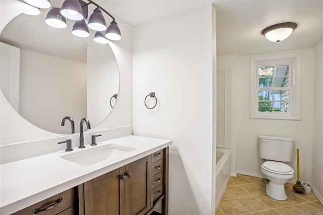 104 N 6th St, Witt, IL 62094 - bathroom with vanity, toilet, baseboards, and tile patterned floors