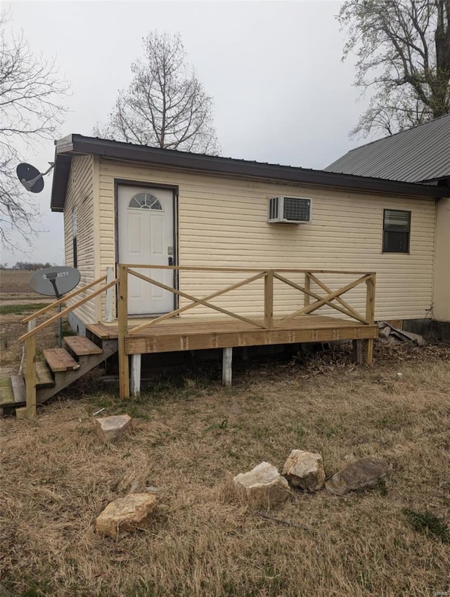 42661 State Highway Mm, Malden, MO 63863 - rear view of property featuring a wooden deck and a wall unit AC