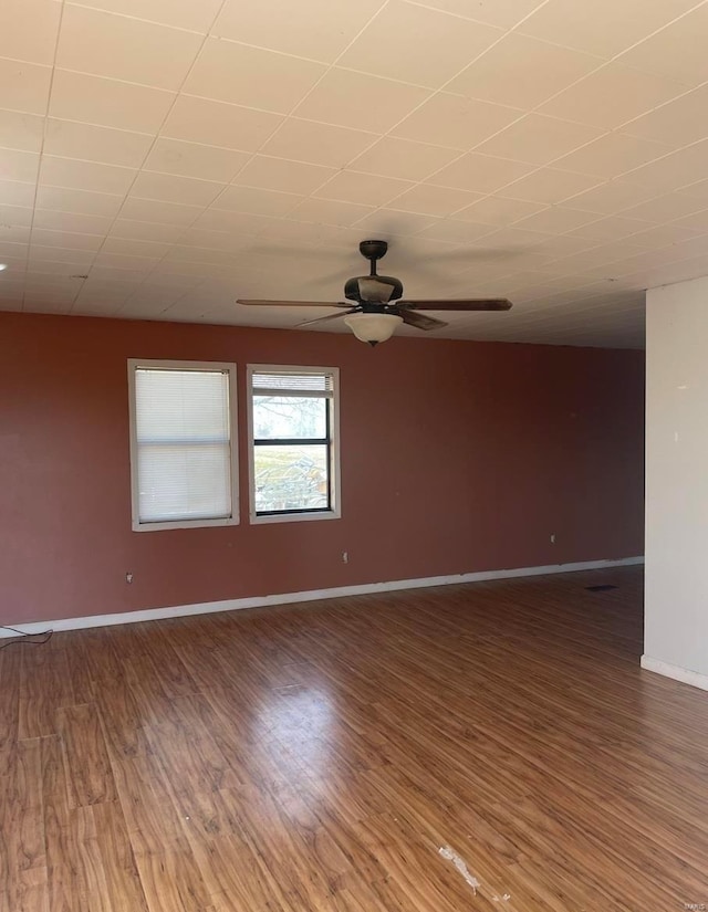 42661 State Highway Mm, Malden, MO 63863 - empty room with wood finished floors, ceiling fan, and baseboards