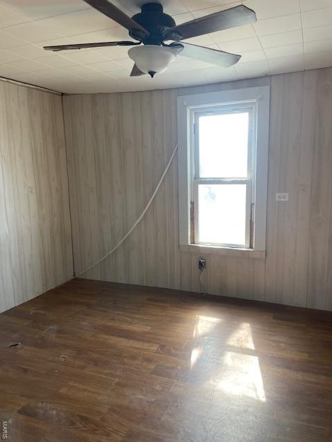 42661 State Highway Mm, Malden, MO 63863 - spare room featuring wood finished floors, wooden walls, and ceiling fan
