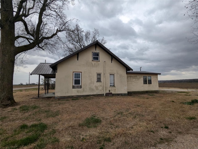 42661 State Highway Mm, Malden, MO 63863 - back of house featuring stucco siding