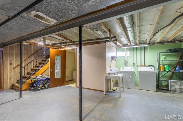 345 Johns Branch Rd, Wappapello, MO 63966 - basement with washer and clothes dryer, stairs, and wood walls
