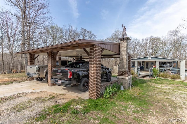 345 Johns Branch Rd, Wappapello, MO 63966 - view of car parking featuring an attached carport and driveway