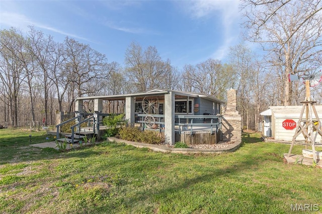 345 Johns Branch Rd, Wappapello, MO 63966 - rear view of property with a lawn and a chimney