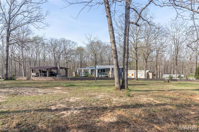 345 Johns Branch Rd, Wappapello, MO 63966 - view of green lawn with a carport