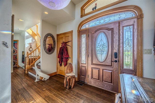 20955 Rye Ln, Richland, MO 65556 - foyer featuring dark wood-style floors and stairs