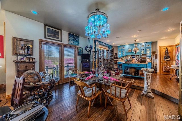 20955 Rye Ln, Richland, MO 65556 - dining space featuring wood-type flooring, recessed lighting, and a chandelier