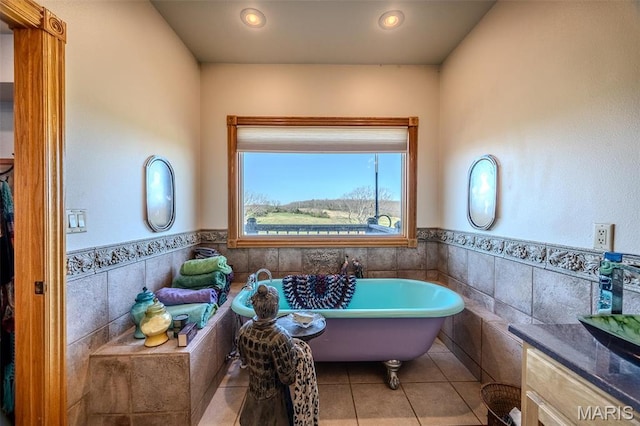 20955 Rye Ln, Richland, MO 65556 - full bathroom with tile walls, a freestanding bath, tile patterned floors, a wainscoted wall, and recessed lighting