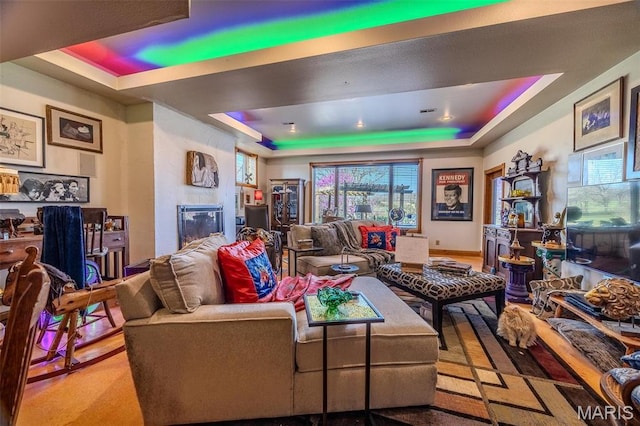 20955 Rye Ln, Richland, MO 65556 - living area with a tray ceiling and a large fireplace