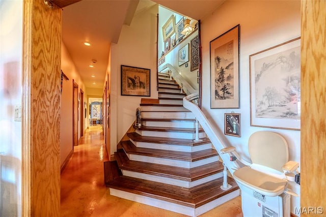 20955 Rye Ln, Richland, MO 65556 - staircase featuring finished concrete floors and recessed lighting