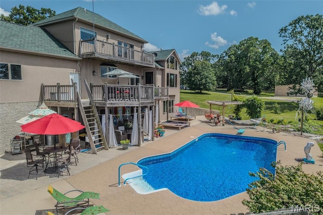 20955 Rye Ln, Richland, MO 65556 - outdoor pool with stairway, a patio, and a deck