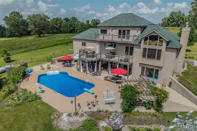 20955 Rye Ln, Richland, MO 65556 - view of swimming pool featuring a patio, a diving board, and stairs