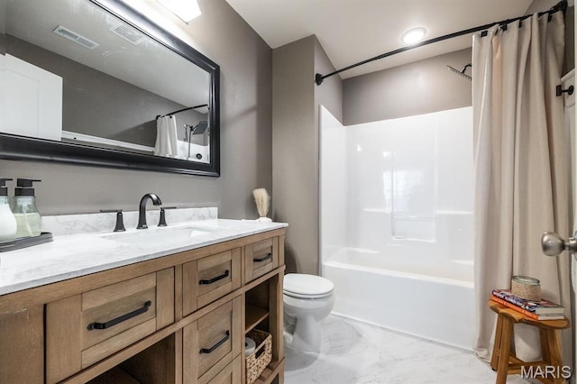 full bath with marble look tile flooring, toilet, shower / bath combo with shower curtain, and vanity