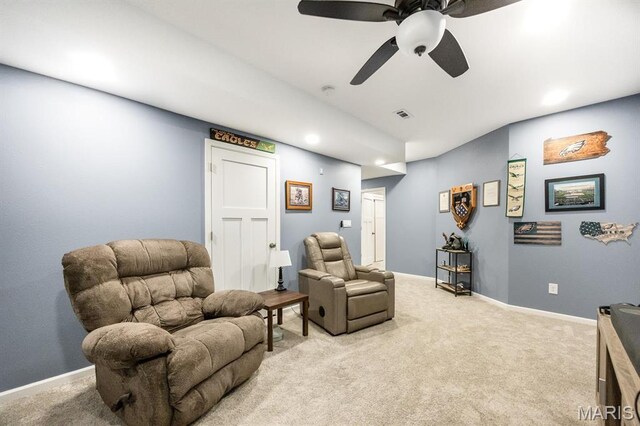 sitting room with a ceiling fan, light carpet, baseboards, and recessed lighting