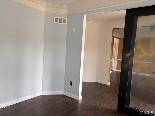 202 Reliance Rd, Foristell, MO 63385 - spare room with dark wood-style flooring, baseboards, and ornamental molding