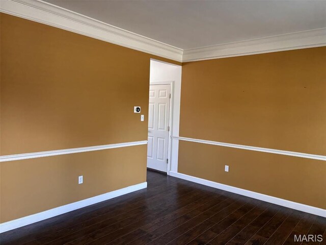 202 Reliance Rd, Foristell, MO 63385 - empty room featuring baseboards, ornamental molding, and dark wood-type flooring