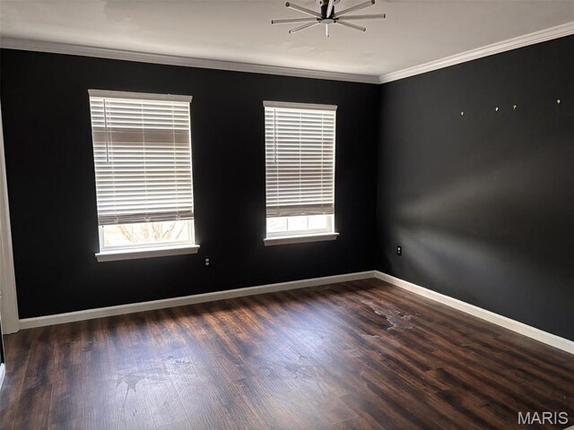 202 Reliance Rd, Foristell, MO 63385 - unfurnished room featuring wood finished floors, baseboards, crown molding, and ceiling fan