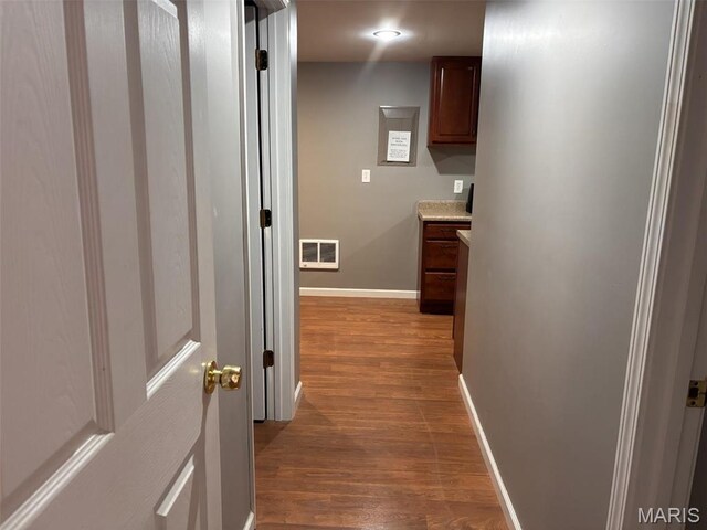 202 Reliance Rd, Foristell, MO 63385 - hallway featuring wood finished floors and baseboards