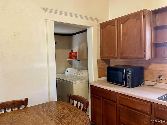 laundry area with washer and dryer