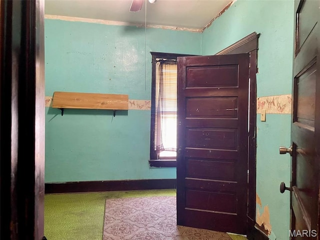 unfurnished room featuring ceiling fan