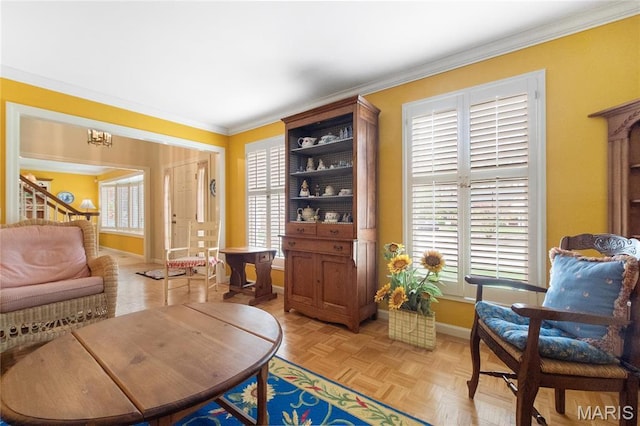 405 Seven Gables Ct, Chesterfield, MO 63017 - living area featuring baseboards, crown molding, and healthy amount of natural light