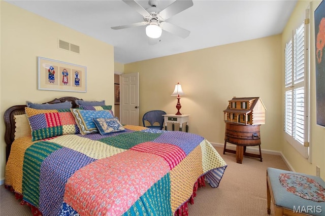 405 Seven Gables Ct, Chesterfield, MO 63017 - bedroom featuring carpet flooring, multiple windows, baseboards, and a ceiling fan