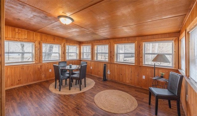sunroom featuring lofted ceiling
