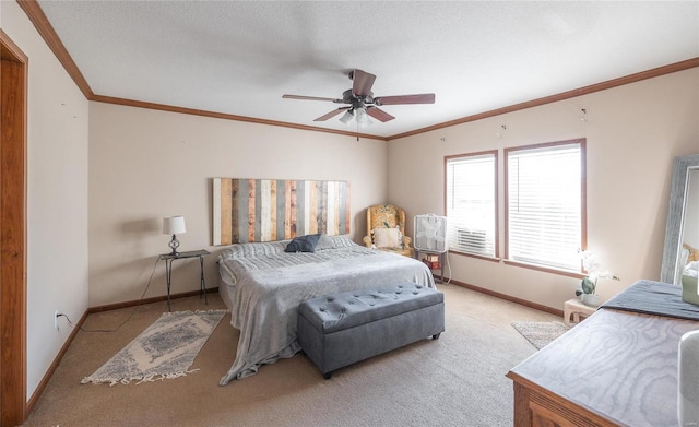 bedroom featuring crown molding, baseboards, carpet floors, ceiling fan, and a textured ceiling