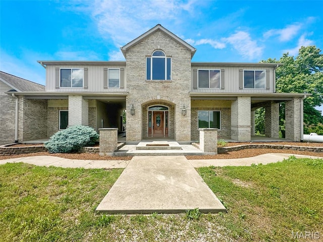 7203 Jakes Pr, Sullivan, MO 63080 - view of front of property with brick siding and a front yard